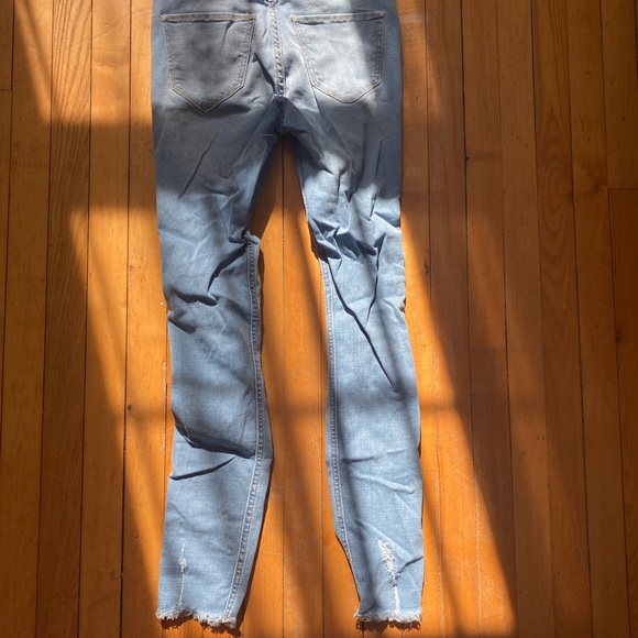 light blue ripped jeans - Picture 2 of 3